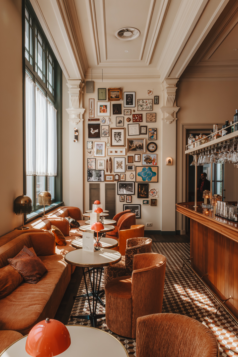 Gallery wall and bar at Hotel Mercier, Amsterdam