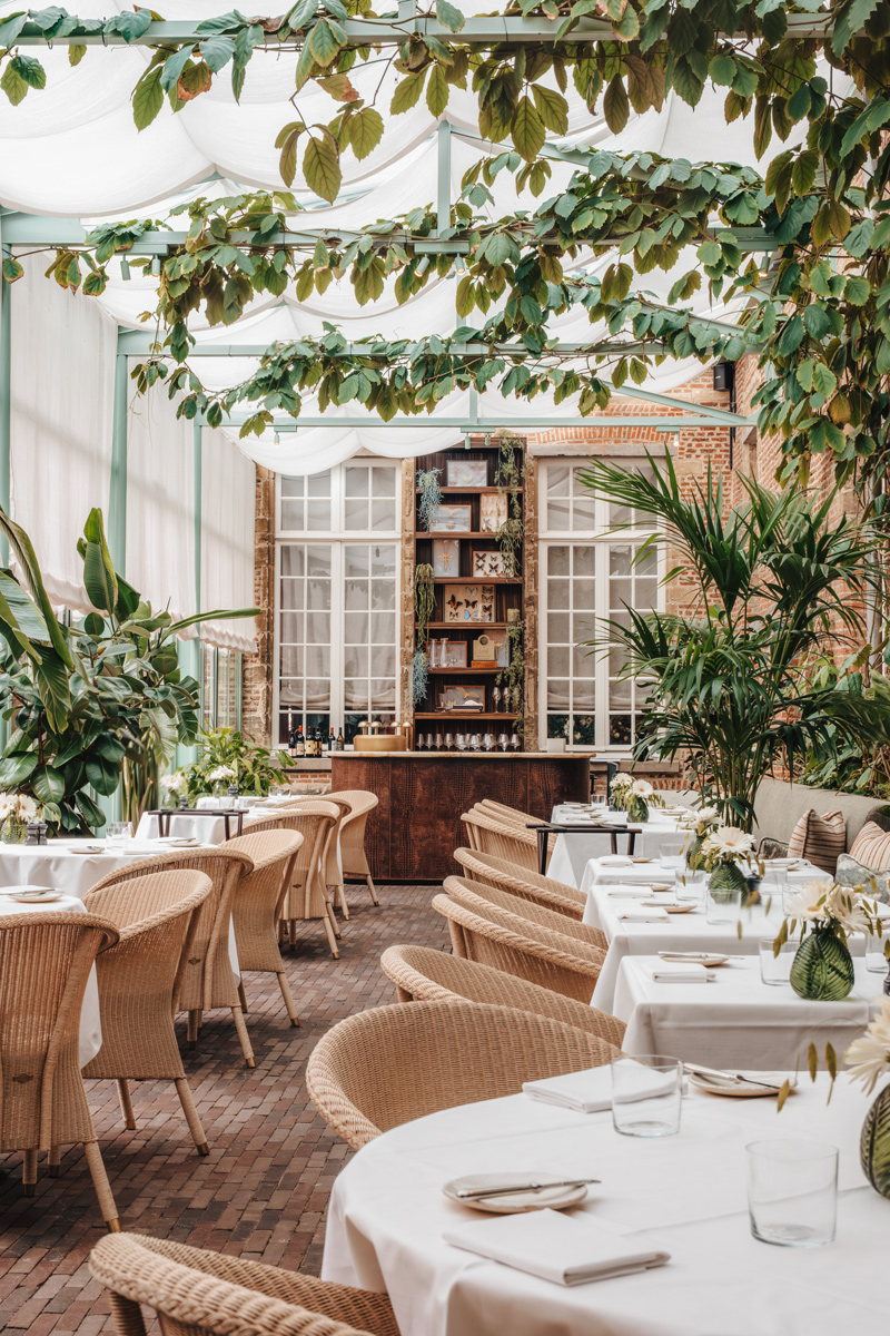 Glass conservatory restaurant at Botanic Sanctuary, Antwerp