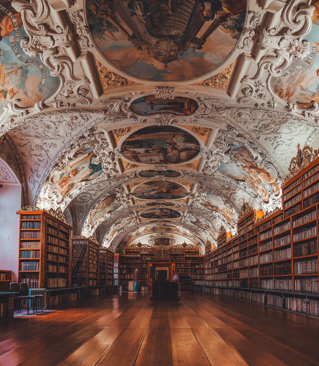 Baroque library hall with ornate ceiling frescoes, Strahov Monastery, Prague